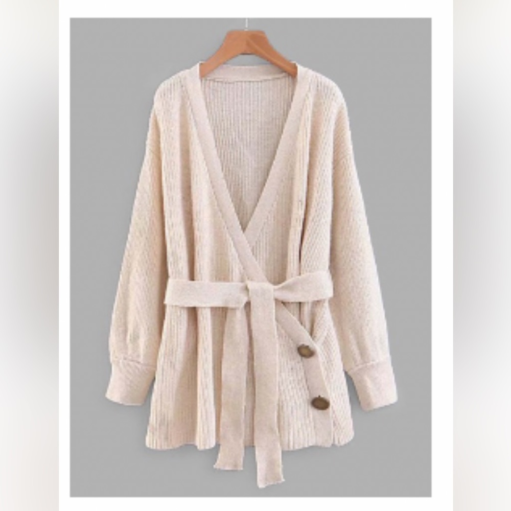 Cream wrap sweater with belt and gold details